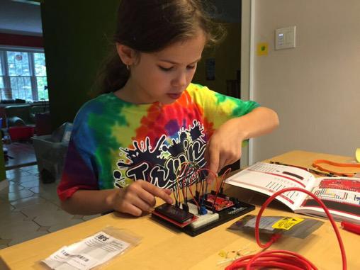My 8 year old daughter building an Arduino LCD circuit